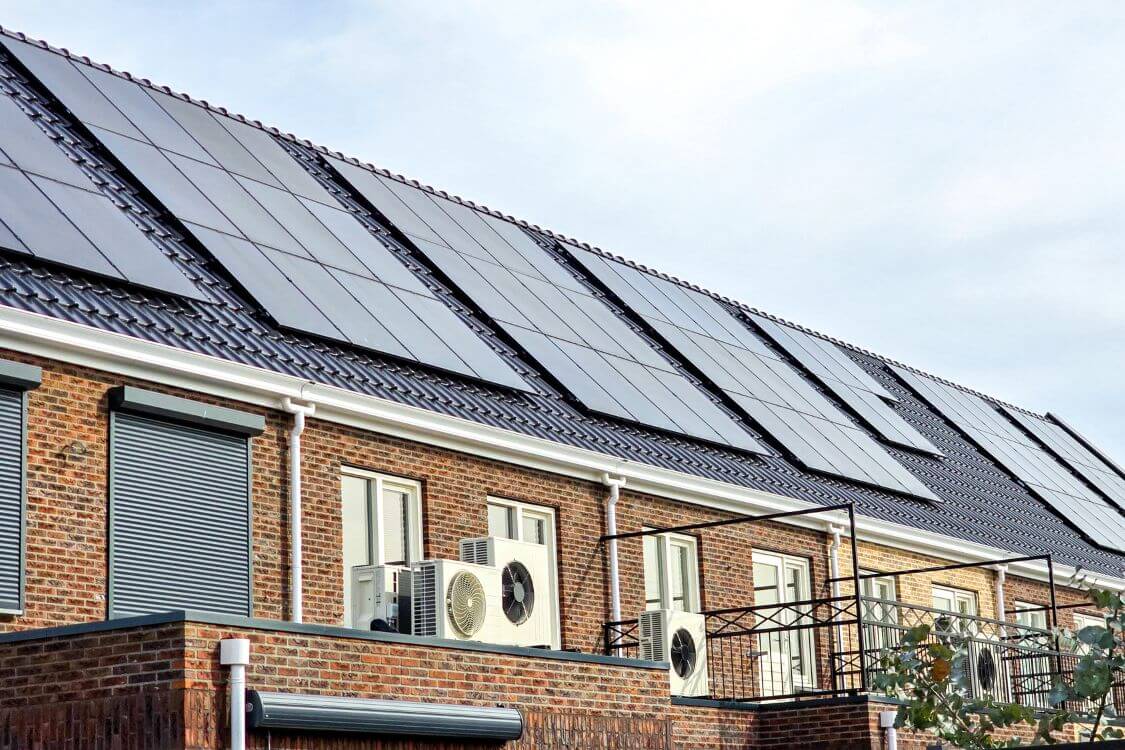 Newly built houses in Edinburgh with solar panels on the roofs